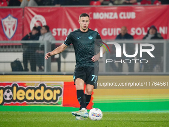 Adam Marusic (SS Lazio) participates in the Italian championship Serie A football match between AC Monza and SS Lazio at U-Power Stadium in...