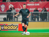 Adam Marusic (SS Lazio) participates in the Italian championship Serie A football match between AC Monza and SS Lazio at U-Power Stadium in...