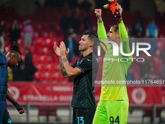 Alessio Romagnoli (SS Lazio) and Ivan Provedel (SS Lazio) celebrate the win during the Italian championship Serie A football match between A...