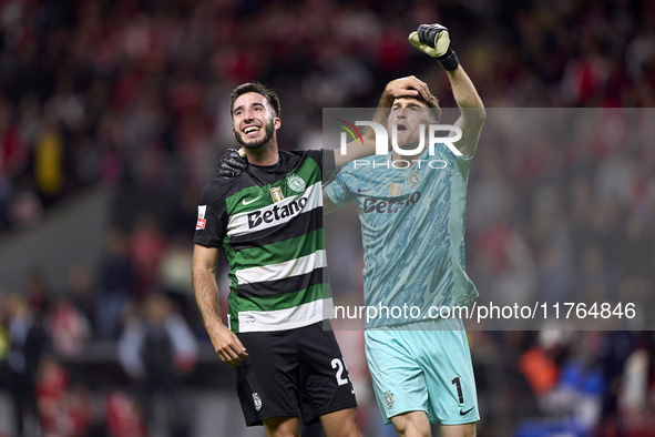 Goncalo Inacio (L) and Franco Israel of Sporting CP celebrate after Conrad Harder (not in frame) scores their side's fourth goal during the...