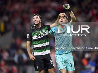 Goncalo Inacio (L) and Franco Israel of Sporting CP celebrate after Conrad Harder (not in frame) scores their side's fourth goal during the...