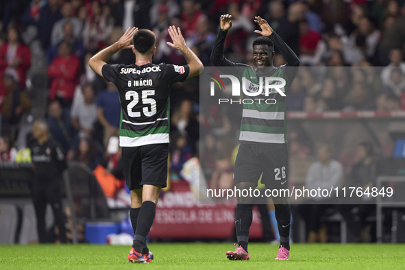 Goncalo Inacio (L) and Ousmane Diomande of Sporting CP celebrate after Conrad Harder (not in frame) scores their side's fourth goal during t...