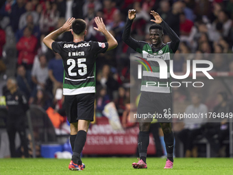 Goncalo Inacio (L) and Ousmane Diomande of Sporting CP celebrate after Conrad Harder (not in frame) scores their side's fourth goal during t...