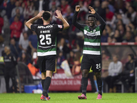 Goncalo Inacio (L) and Ousmane Diomande of Sporting CP celebrate after Conrad Harder (not in frame) scores their side's fourth goal during t...