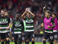 Players of Sporting CP celebrate victory after the Liga Portugal Betclic match between SC Braga and Sporting CP at Estadio Municipal de Brag...