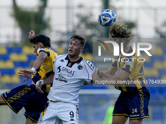 Francesco Pio Esposito of Spezia Calcio competes for the ball with Marco Varnier of SS Juve Stabia during the Serie B match between SS Juve...