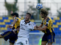 Francesco Pio Esposito of Spezia Calcio competes for the ball with Marco Varnier of SS Juve Stabia during the Serie B match between SS Juve...