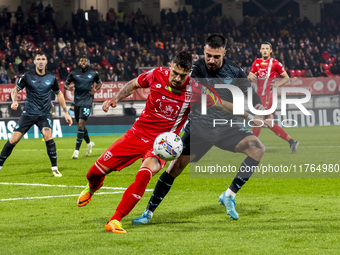 Dany Mota and Mario Gila play during the Serie A match between AC Monza and SS Lazio at U-Power Stadium in Monza, Italy, on November 10, 202...