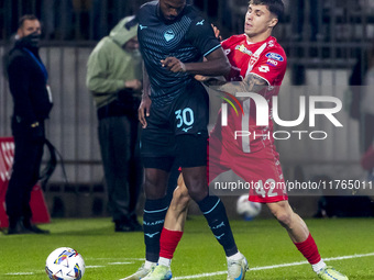 Nuno Tavares and Alessandro Bianco are in action during the Serie A match between AC Monza and SS Lazio at U-Power Stadium in Monza, Italy,...