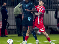 Nuno Tavares and Alessandro Bianco are in action during the Serie A match between AC Monza and SS Lazio at U-Power Stadium in Monza, Italy,...