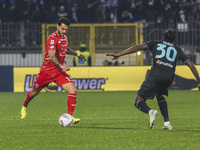 Pedro Pereira and Nuno Tavares are in action during the Serie A match between AC Monza and SS Lazio at U-Power Stadium in Monza, Italy, on N...