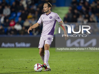 Daley Blind of Girona FC is in action with the ball during the La Liga EA Sports 2024/25 football match between Getafe CF and Girona FC at E...