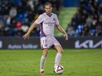 Daley Blind of Girona FC is in action with the ball during the La Liga EA Sports 2024/25 football match between Getafe CF and Girona FC at E...