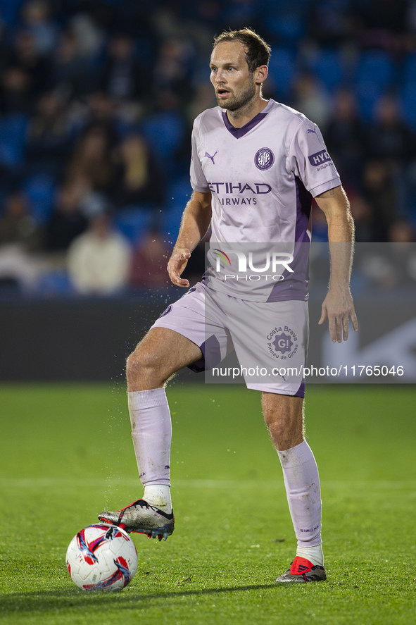 Daley Blind of Girona FC is in action with the ball during the La Liga EA Sports 2024/25 football match between Getafe CF and Girona FC at E...