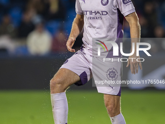 Daley Blind of Girona FC is in action with the ball during the La Liga EA Sports 2024/25 football match between Getafe CF and Girona FC at E...