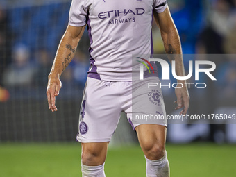 Oriol Romeu of Girona FC is in action with the ball during the La Liga EA Sports 2024/25 football match between Getafe CF and Girona FC at E...