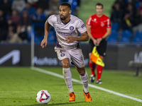 Yangel Herrera of Girona FC is in action with the ball during the La Liga EA Sports 2024/25 football match between Getafe CF and Girona FC a...