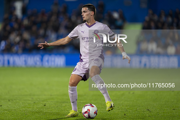 Miguel Gutierrez of Girona FC is in action with the ball during the La Liga EA Sports 2024/25 football match between Getafe CF and Girona FC...