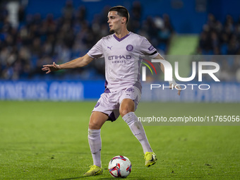 Miguel Gutierrez of Girona FC is in action with the ball during the La Liga EA Sports 2024/25 football match between Getafe CF and Girona FC...