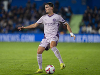 Miguel Gutierrez of Girona FC is in action with the ball during the La Liga EA Sports 2024/25 football match between Getafe CF and Girona FC...