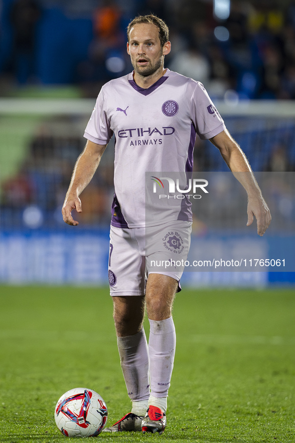 Daley Blind of Girona FC is in action with the ball during the La Liga EA Sports 2024/25 football match between Getafe CF and Girona FC at E...