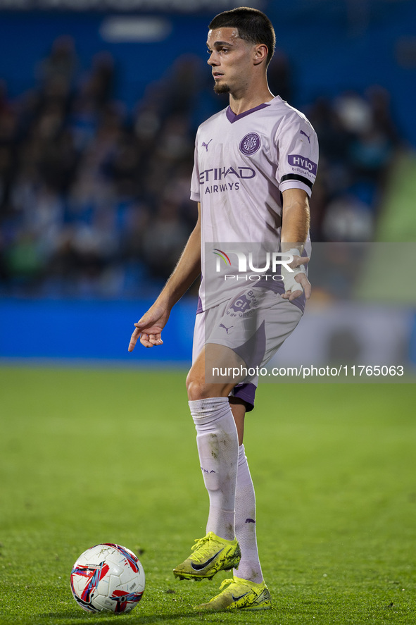 Miguel Gutierrez of Girona FC is in action with the ball during the La Liga EA Sports 2024/25 football match between Getafe CF and Girona FC...