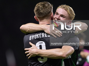 Conrad Harder of Sporting CP celebrates victory with Viktor Gyokeres after the Liga Portugal Betclic match between SC Braga and Sporting CP...