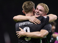 Conrad Harder of Sporting CP celebrates victory with Viktor Gyokeres after the Liga Portugal Betclic match between SC Braga and Sporting CP...