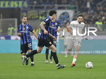 Khvicha Kvaratskhelia participates in the Serie A 2024-2025 match between Inter and Napoli in Milano, Italy, on November 10, 2024. (