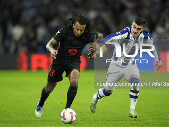 Jules Kounde centre-back of Barcelona and France and Ander Barrenetxea left winger of Real Sociedad and Spain compete for the ball during th...