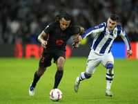 Jules Kounde centre-back of Barcelona and France and Ander Barrenetxea left winger of Real Sociedad and Spain compete for the ball during th...