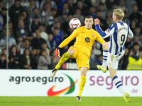 Inaki Pena goalkeeper of Barcelona and Spain and Orri Oskarsson centre-forward of Real Sociedad and Iceland compete for the ball during the...