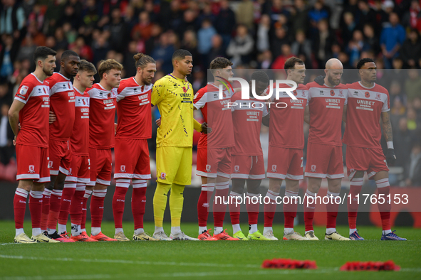 Middlesbrough FC players line up to pay respects for Remembrance Sunday during the Sky Bet Championship match between Middlesbrough and Luto...