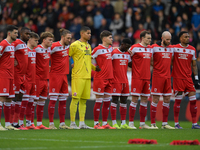 Middlesbrough FC players line up to pay respects for Remembrance Sunday during the Sky Bet Championship match between Middlesbrough and Luto...