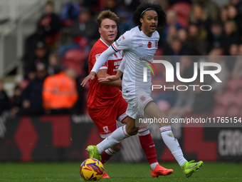 Aidan Morris of Middlesbrough and Tahith Chong of Luton Town participate in the Sky Bet Championship match between Middlesbrough and Luton T...