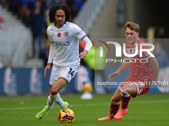 Tahith Chong of Luton Town and Aidan Morris of Middlesbrough participate in the Sky Bet Championship match between Middlesbrough and Luton T...