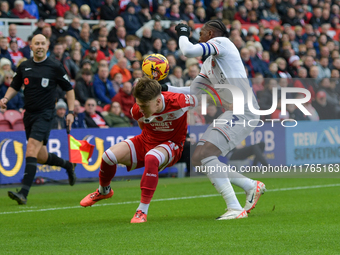 Middlesbrough's Ben Doak tangles with Luton Town's Amari'i Bell during the Sky Bet Championship match between Middlesbrough and Luton Town a...