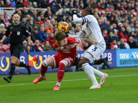 Middlesbrough's Ben Doak tangles with Luton Town's Amari'i Bell during the Sky Bet Championship match between Middlesbrough and Luton Town a...