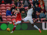 George Edmundson of Middlesbrough clears the ball upfield during the Sky Bet Championship match between Middlesbrough and Luton Town at the...