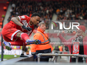 Delano Burgzorg scores to put Middlesbrough 1-0 and jumps into the Middlesbrough fans during the Sky Bet Championship match between Middlesb...