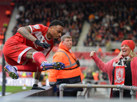 Delano Burgzorg scores to put Middlesbrough 1-0 and jumps into the Middlesbrough fans during the Sky Bet Championship match between Middlesb...