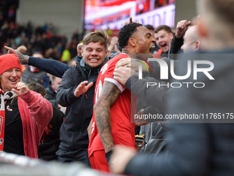 Delano Burgzorg scores to put Middlesbrough 1-0 and jumps into the Middlesbrough fans during the Sky Bet Championship match between Middlesb...