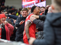 Delano Burgzorg scores to put Middlesbrough 1-0 and jumps into the Middlesbrough fans during the Sky Bet Championship match between Middlesb...