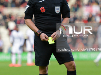 Match referee Tony Harrington officiates during the Sky Bet Championship match between Middlesbrough and Luton Town at the Riverside Stadium...