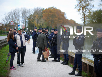 Residents support the 'ecureuils' living in trees that are to be cut for the LGV project. The gendarmerie blocks access to one of the rivers...