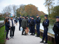 Residents support the 'ecureuils' living in trees that are to be cut for the LGV project. The gendarmerie blocks access to one of the rivers...