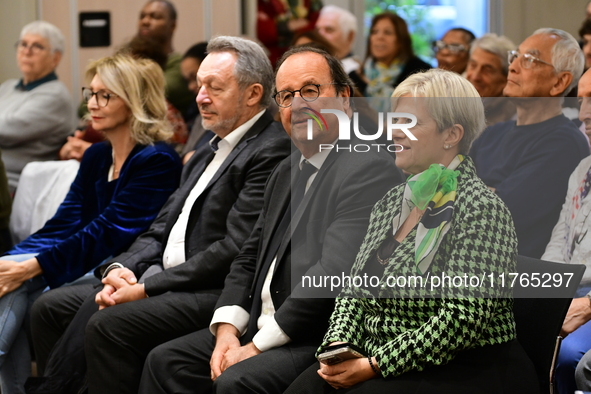 Former President of the Republic Francois Hollande and Mayor of Vaulx en Velin Helene Geoffroy meet in Lyon, France, on November 10, 2024, f...