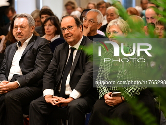 Former President of the Republic Francois Hollande and Mayor of Vaulx en Velin Helene Geoffroy meet in Lyon, France, on November 10, 2024, f...