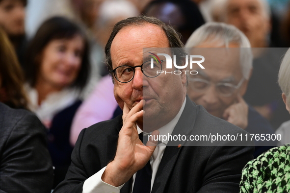 Former President of the Republic Francois Hollande and Mayor of Vaulx en Velin Helene Geoffroy meet in Lyon, France, on November 10, 2024, f...