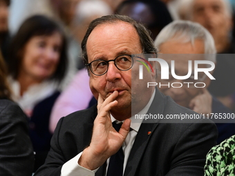 Former President of the Republic Francois Hollande and Mayor of Vaulx en Velin Helene Geoffroy meet in Lyon, France, on November 10, 2024, f...